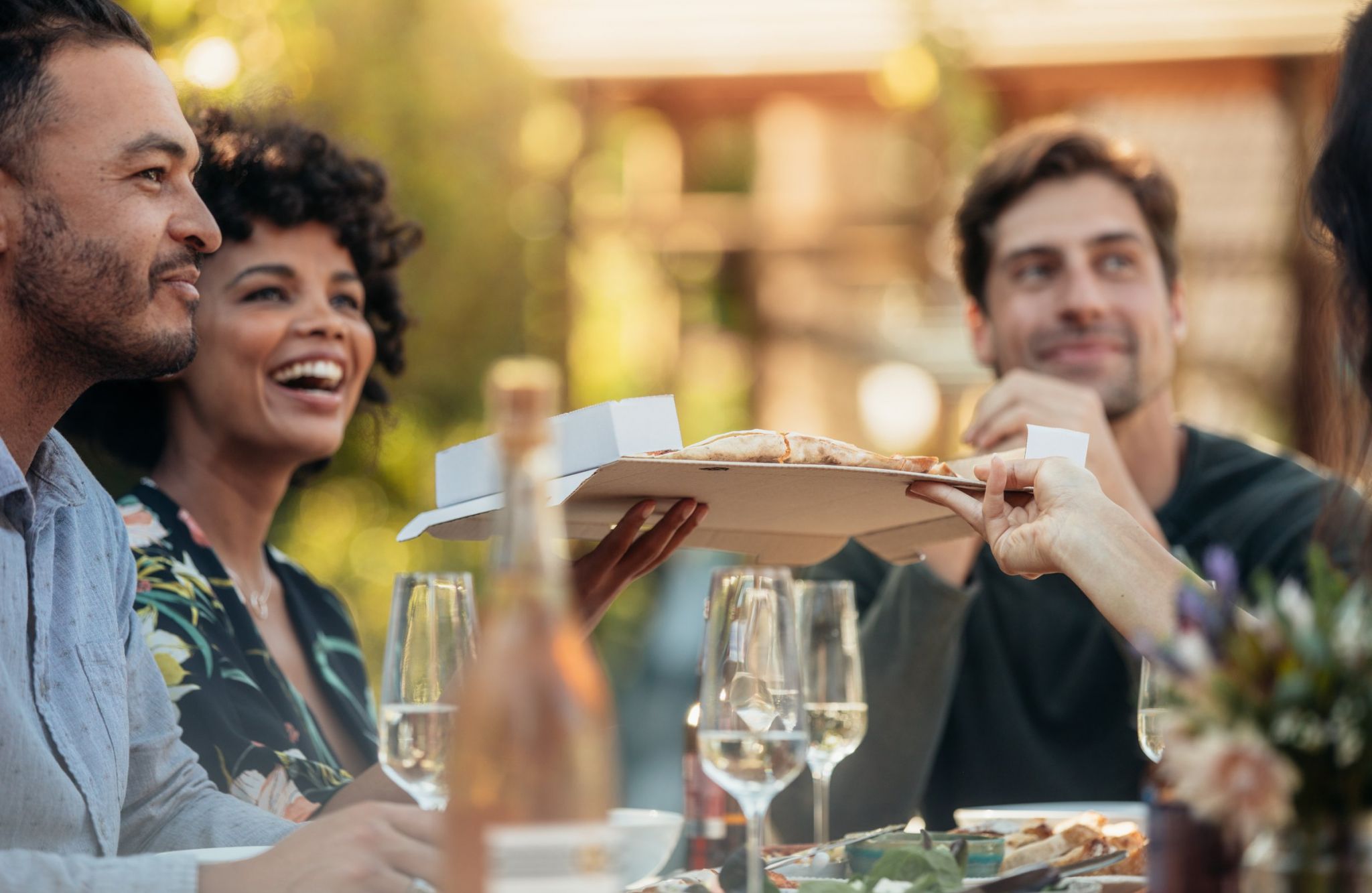 Friends having food at party outdoors