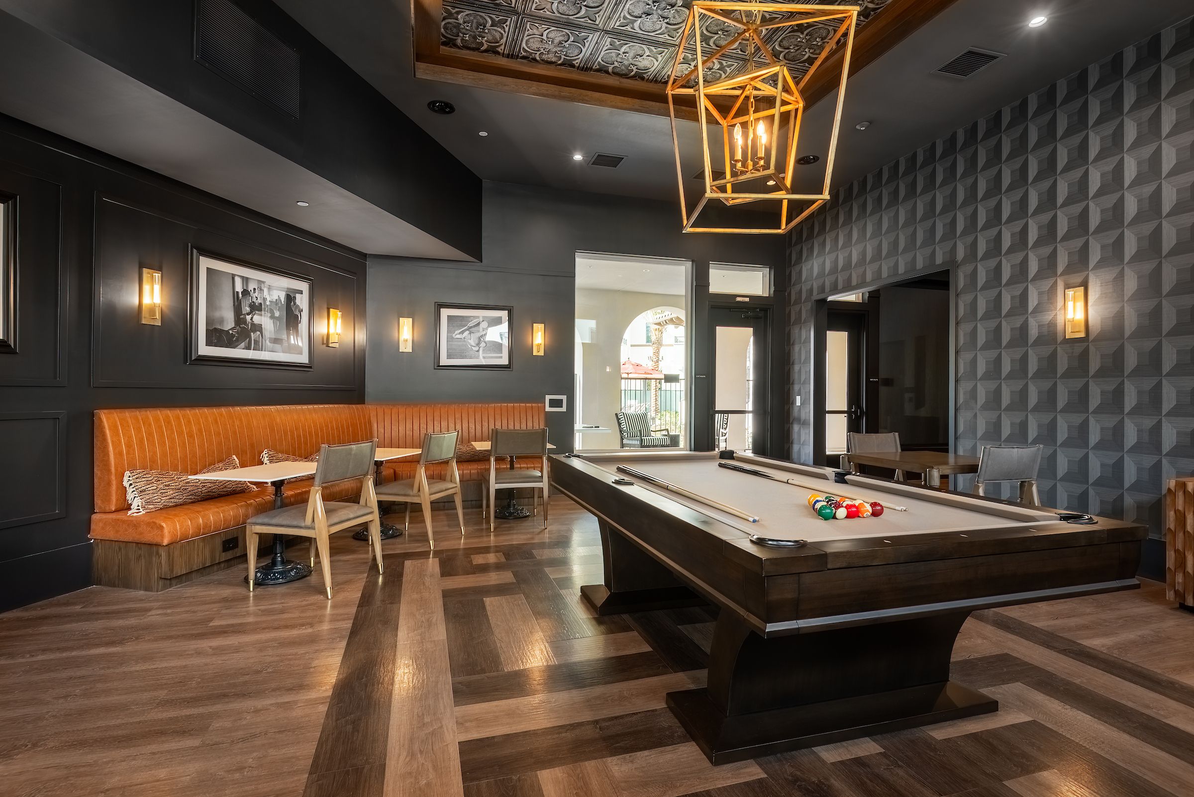 Resident lounge with pool table at Solana Winchester Hills apartments in Temecula.